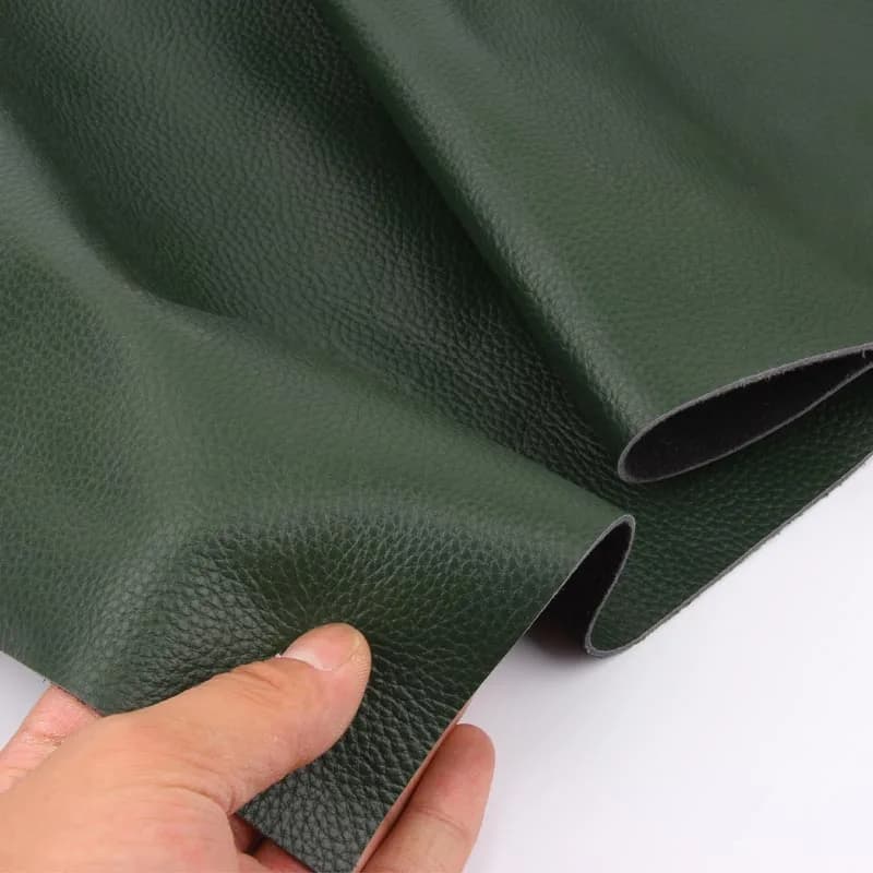 Das ganze Stück aus Rindsledermaterial, Oberschichtleder, dunkelgrüner Sofa-Lederstoff mit Litschi-Muster, Tisch aus echtem Leder c