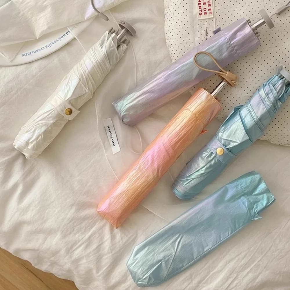 Aurora Schillernder Bleistiftschirm für Zuhause, tragbar, ultraleicht, mit Federn, manuell faltbar, Sonnenschirm, kreativer UV-Schutz-Sonnenschirm